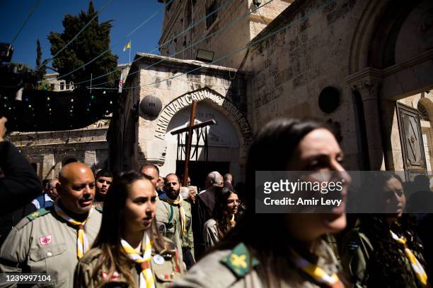 Christian worshippers take part in a Good Friday procession along the Via Dolorosa during Easter Holy week on April 15, 2022 in Jerusalem, Israel....