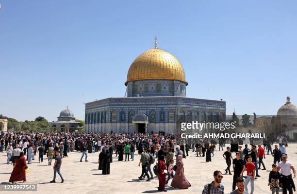 Palestinian Muslims gather at Jerusalem's Al-Aqsa mosque complex following Friday prayers during the holy month of Ramadan on April 15, 2022. - More...