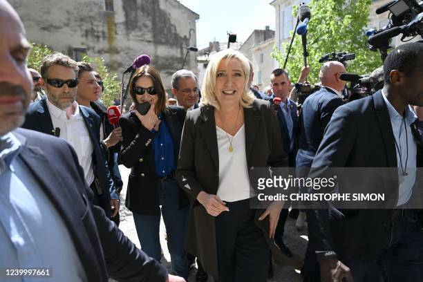 French far-right party Rassemblement National presidential candidate Marine Le Pen arrives for a campaign visit in Lauris, South of France, on April...