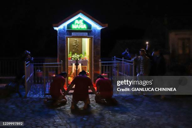 Men known as "Vattienti", the faithful penitents scourging their thighs as part of the "Vattienti" religious ritual of flagellation during Holy Week,...