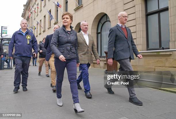 First Minister Nicola Sturgeon walks through Perth's city centre with Deputy First Minister John Swinney during local election campaigning on April...