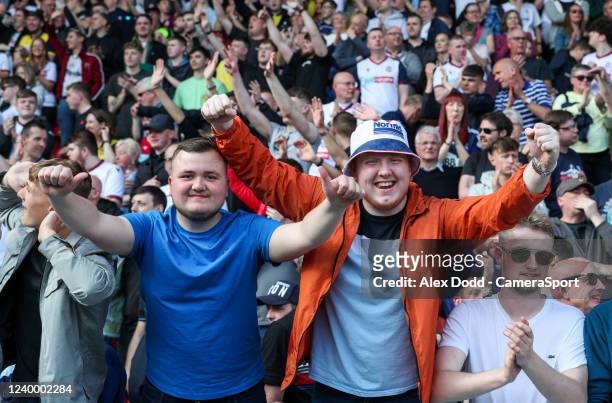 Bolton Wanderers fans celebrate during the Sky Bet League One match between Doncaster Rovers and Bolton Wanderers at Keepmoat Stadium on April 15,...