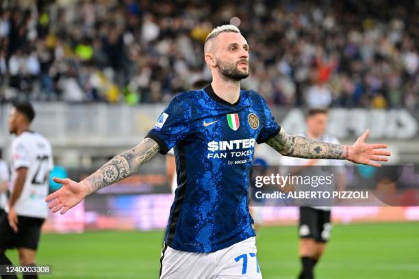 Inter Milan's Croatian midfielder Marcelo Brozovic celebrates after opening the scoring during the Italian Serie A football match between Spezia and...