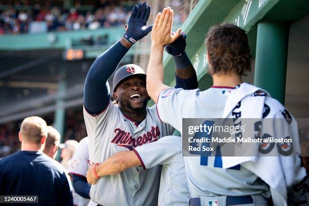 Miguel Sano of the Minnesota Twins reacts in the dugout after hitting a two-run home run in the second inning of the Opening Day game against the...