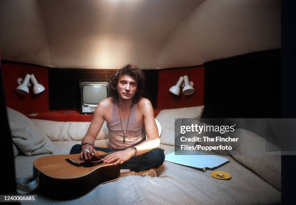 French rock and roll musician Johnny Hallyday in his motor-home while on his "Johnny Circus" tour in France, circa 1972.