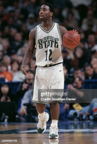 Mateen Cleaves, Guard for the Michigan State Spartans dribbles the ball downcourt during the NCAA Big-10 Conference tournament college basketball...