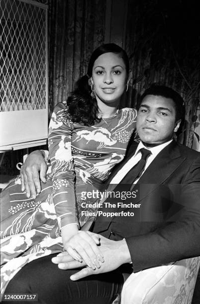 American heavyweight boxer Muhammad Ali photographed with his wife Veronica Porche at their home in Chicago, USA circa 1977.