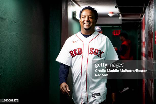 Former Boston Red Sox pitcher Pedro Martinez walks through the batting tunnel before the Opening Day game between the Minnesota Twins and the Boston...