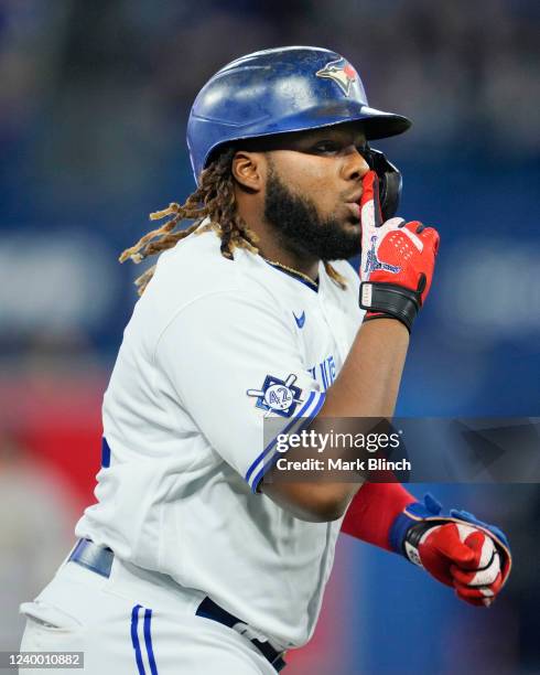 Vladimir Guerrero Jr. #27 of the Toronto Blue Jays celebrates his home against the Oakland Athletics in the first inning during their MLB game at the...