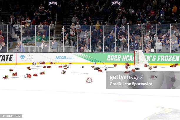 Denver equipment litters the ice after the NCAA Frozen Four final between the Denver Pioneers and the Minnesota State Mavericks on April 9 at TD...