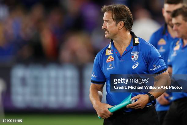 Luke Beveridge, Senior Coach of the Bulldogs looks on during the 2022 AFL Round 05 match between the North Melbourne Kangaroos and the Western...