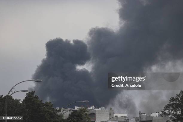 Smoke is seen rising over Darnytskyi District of Kyiv, Ukraine on April 16, 2022.