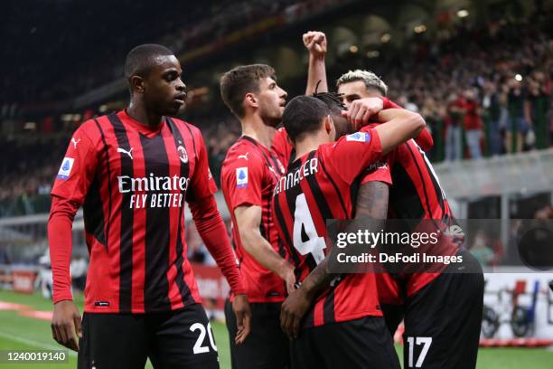 Rafael Leao of AC Milan celebrates after scoring his team's first goal with team mates during the Serie A match between AC Milan and Genoa CFC at...