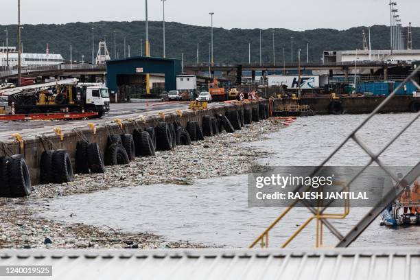 Picture shows massive debris at the Durban harbour following heavy rains, mudslides and rain and winds in Durban, on April 16, 2022 as the death toll...