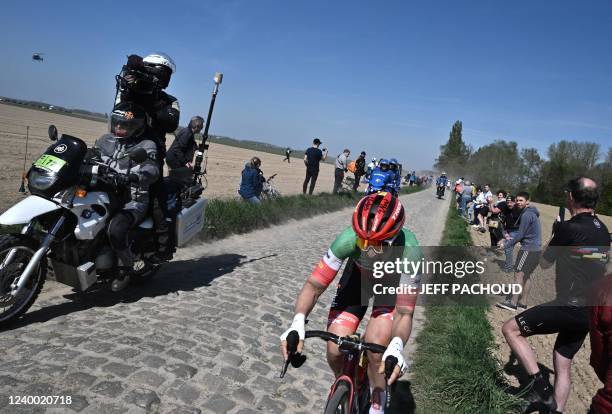 Trek-Segafredo's Italian rider Elisa Longo Borghini rides in a breakaway during the second edition of the Paris-Roubaix one-day classic cycling race,...