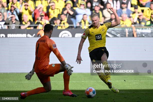Dortmund's Norwegian forward Erling Braut Haaland tries to score during the German first division Bundesliga football match Borussia Dortmund v VfL...