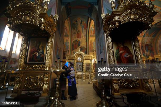 2022Lydia Mychisla Vena hugs a friend in the Alexander Nevsky Cathedral where she helps keep things running. As the threat of a second offensive by...