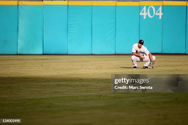Center fielder Bryan Petterson of the Florida Marlins plays the field against the New York Mets at Sun Life Stadium on September 7, 2011 in Miami...