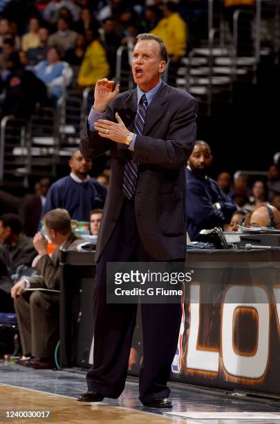 Head coach Doug Collins of the Washington Wizards watches the game against the San Antonio Spurs on December 31, 2002 at the MCI Center in Washington...