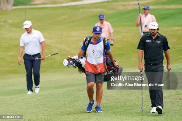 Mark Hubbard and his caddie walks to the second hole green during the final round of the Veritex Bank Championship at Texas Rangers Golf Club on...