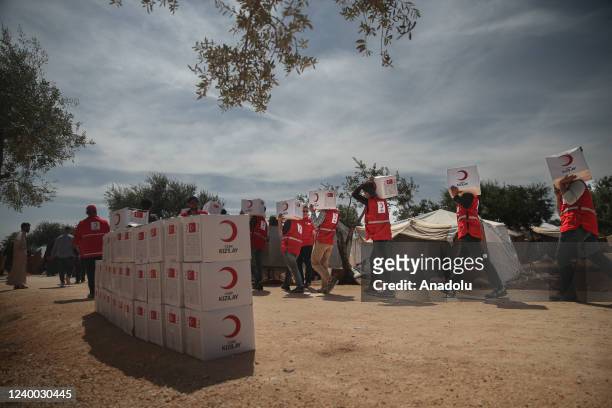 Turkish Red Crescent distributes humanitarian assistance for Syrians in Idlib, Syria on April 16, 2022.
