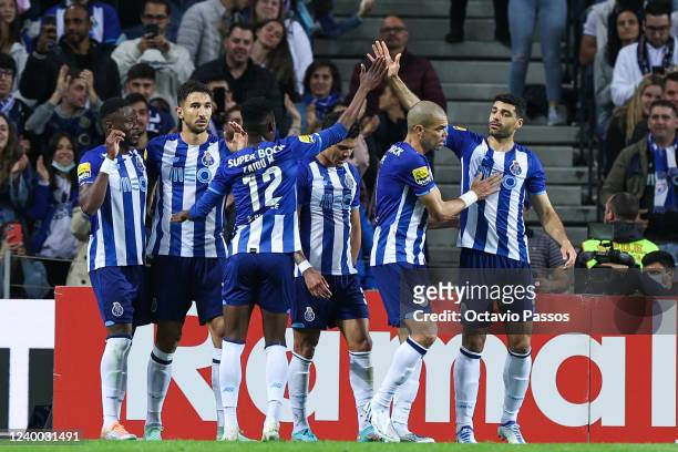 Marko Grujic of FC Porto celebrates whit teammates after scores his sides second goal during the Liga Portugal Bwin match between FC Porto and...