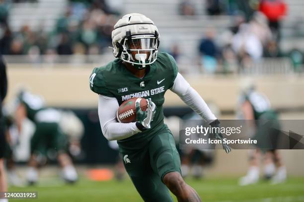 Michigan State Spartans wide receiver Germie Bernard runs up field during a receiving drill at the Michigan State Spring Game on April 16, 2022 at...