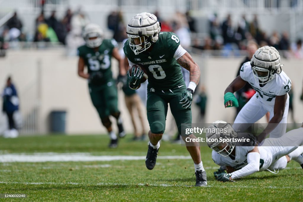 Michigan State Spring Michigan State Spartans running back Jalen Berger breaks a tackle ...