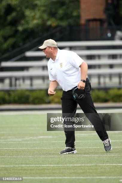 Vanderbilt Commodores offensive line coach AJ Blazek yells instruction to his players from the sideline during the Vanderbilt Commodores Black and...