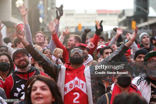 Toronto Raptors cheer every rebound and basket by the Raptors as the Toronto Raptors fans gather in Jurassic Park as they play the Philadelphia 76ers...