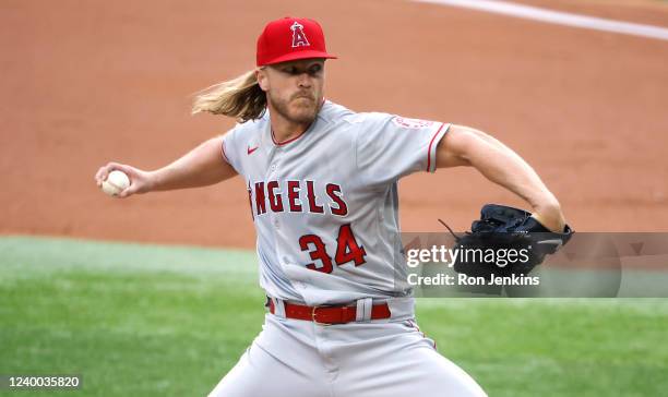 Noah Syndergaard of the Los Angeles Angels pitches against the Texas Rangers during the first inning at Globe Life Field on April 16, 2022 in...