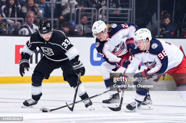 Los Angeles Kings left wing Viktor Arvidsson, Columbus Blue Jackets left wing Patrik Laine and Jack Roslovic battle for position during the first...