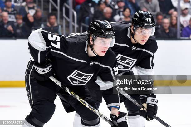Los Angeles Kings defenseman Jacob Moverare and center Trevor Moore get ready for the play during the second period against the Columbus Blue Jackets...