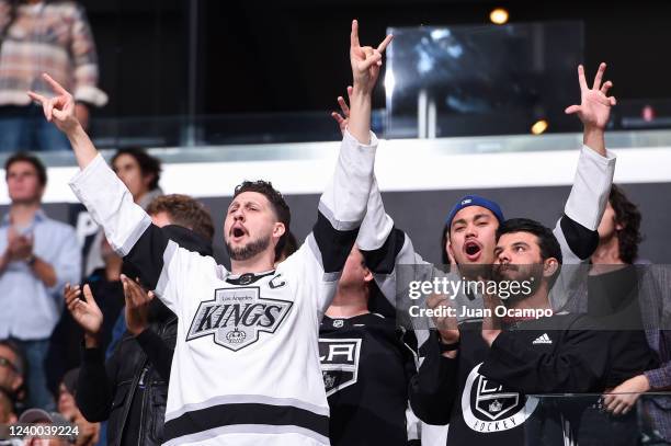 Los Angeles Kings fans celebrate during the third period against the Columbus Blue Jackets at Crypto.com Arena on April 16, 2022 in Los Angeles,...