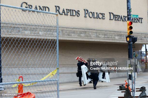 Barriers are set up outside the Grand Rapids Police Department ahead of a march for Patrick Lyoya, a Black man who was fatally shot by a police...