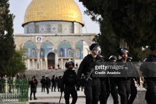 Israeli forces take security measures as groups of activist Jewish settlers escorted by forces raid Al-Aqsa Mosque Compound after a morning prayer in...