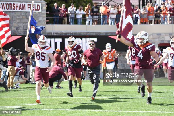 Virginia Tech Hokies coach Brent Pry leads his team out on the field before the Virginia Tech spring game on April 16 at Lane Stadium in Blacksburg...