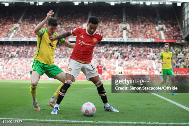 Jesse Lingard of Manchester United battles with Sam Byram of Norwich City during the Premier League match between Manchester United and Norwich City...
