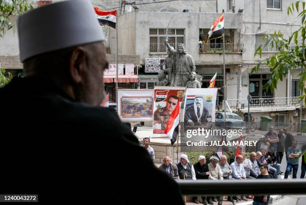 Druze residents of the Israeli-annexed Golan Heights gather during a rally in the village of Majdal Shams to mark Syria's Independence Day, on April...