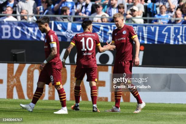 Simon Terodde of FC Schalke 04 celebrate his goal during the Second Bundesliga match between SV Darmstadt 98 and FC Schalke 04 at Merck-Stadion am...