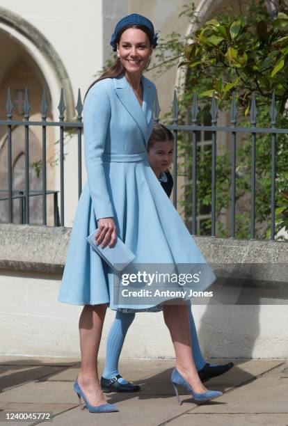 The Duchess of Cambridge with Princess Charlotte attend the traditional Easter Sunday Church service at St Georges Chapel in the grounds of Windsor...