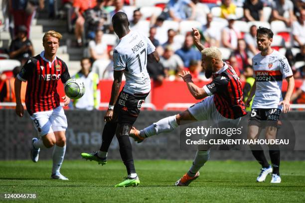 Nice's French forward Andy Delort shoots and scores his team's second goal during the French L1 football match between OGC Nice and FC Lorient at the...