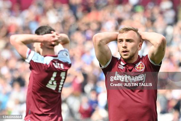 West Ham United's English striker Jarrod Bowen reacts after missing to score during the English Premier League football match between West Ham United...