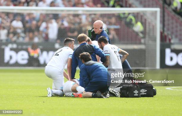 Concern for Burnley's Ashley Westwood during the Premier League match between West Ham United and Burnley at London Stadium on April 17, 2022 in...