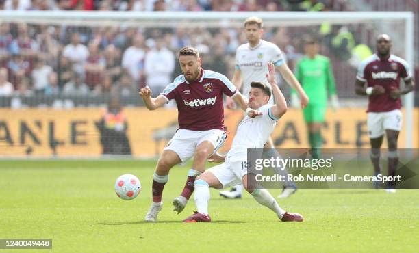 Burnley's Ashley Westwood suffers a bad injury after this challenge on West Ham United's Nikola Vlasic during the Premier League match between West...