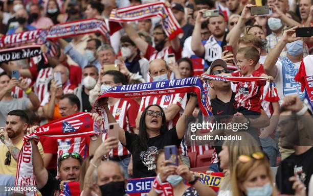 Fans cheer ahead of the La Liga week 32 match between Atletico Madrid and Espanyol at Wanda Metropolitano in Madrid, Spain on April 17, 2022.