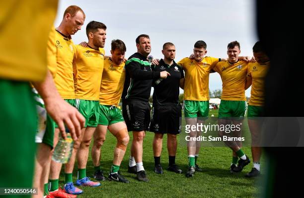 London , United Kingdom - 17 April 2022; London manager Michael Maher, centre, gives a team talk before the Connacht GAA Football Senior Championship...