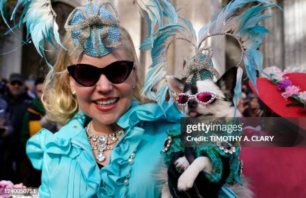 Summer Strand and her dog during the annual Easter Parade and Bonnet Festival on Fifth Avenue in front of St. Patrick's Cathedral in New York City on...