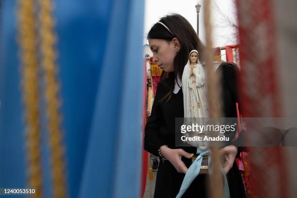 Members of the clergy and believers take part in the Easter procession and confession at the Catholic Church of the Intercession of the Virgin Mary...