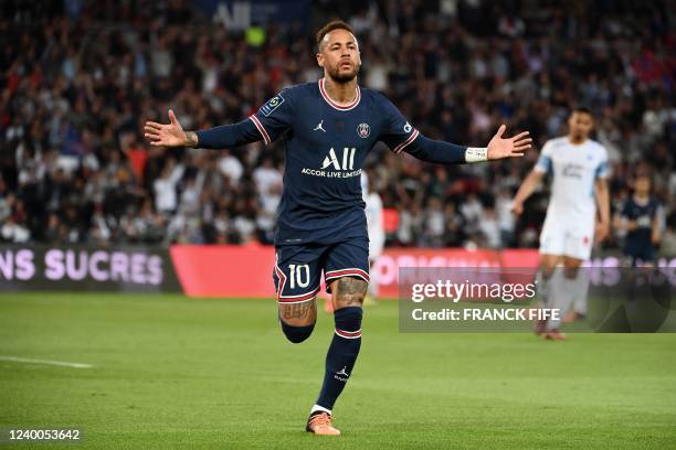 Paris Saint-Germain's Brazilian forward Neymar celebrates scoring his team's first goal during the French L1 football match between Paris-Saint...